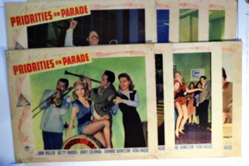 ORIGINAL LOBBY CARDS - PRIORITIES ON PARADE - 1942 - set of 8