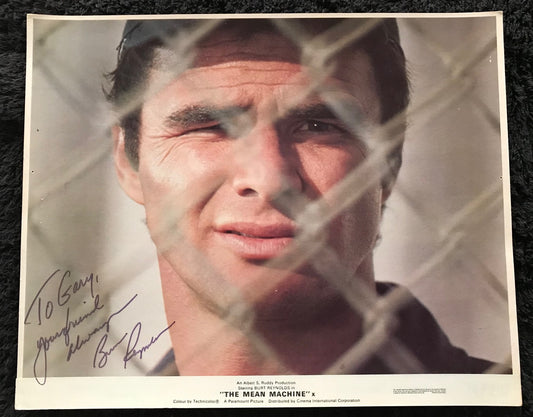 BURT REYNOLDS - AUTOGRAPHED 10 x 8 PUBLICITY PHOTOGRAPH from The Mean Machine (1974)