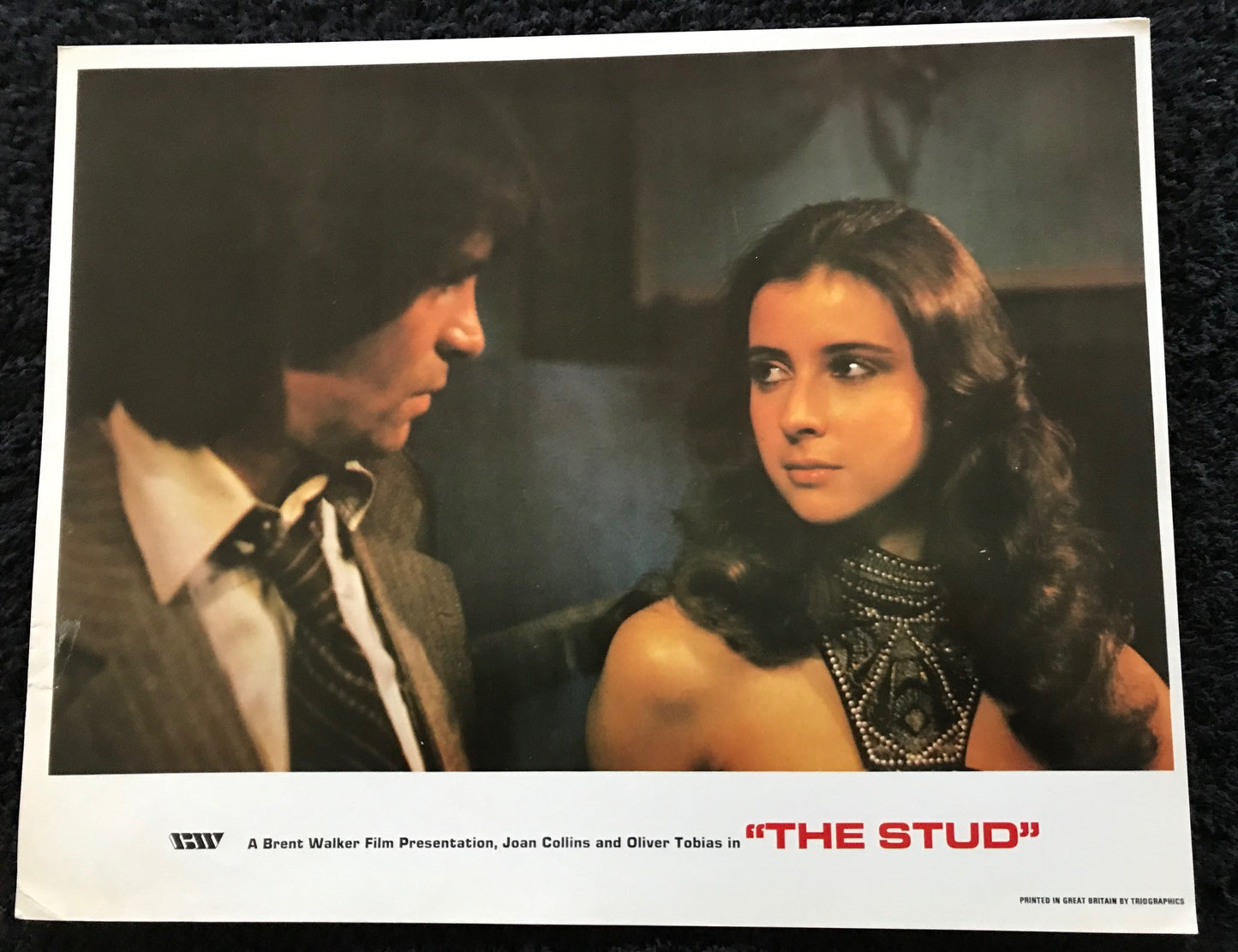ORIGINAL LOBBY CARDS - THE STUD - 1978 - group of 10 cards -  Joan Collins, Sue Lloyd, Walter Gotell, Oliver Tobias