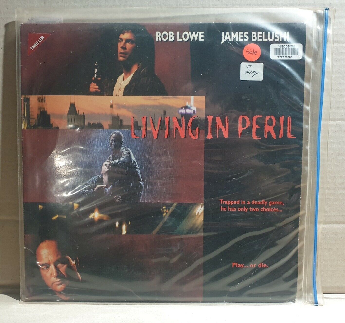 LASERDISC MOVIE - LIVING IN PERIL - Rob Lowe, James Belushi