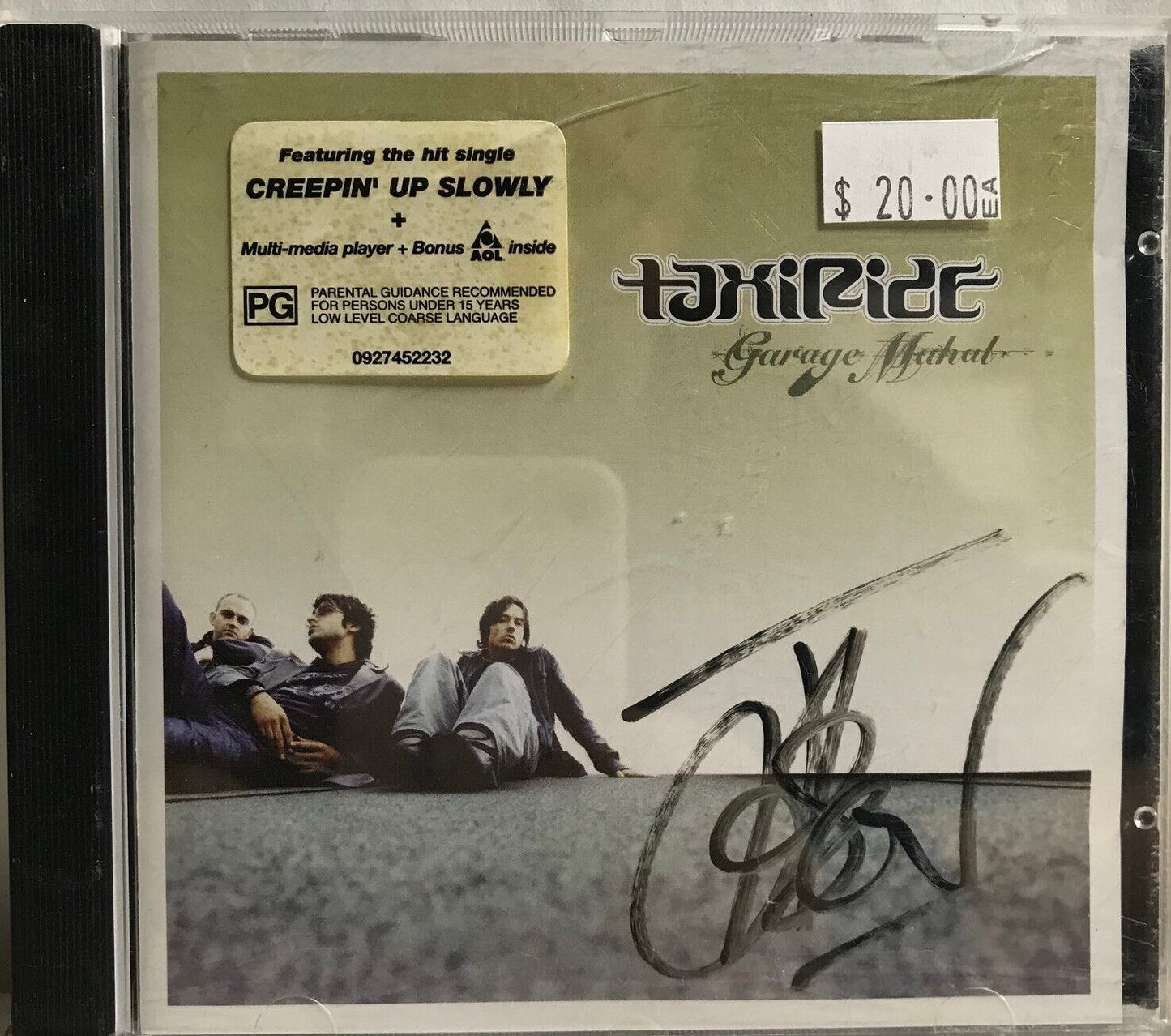 MUSIC CD IN CASE (COVER SIGNED) - TAXIRIDE - GARAGE MAHAL