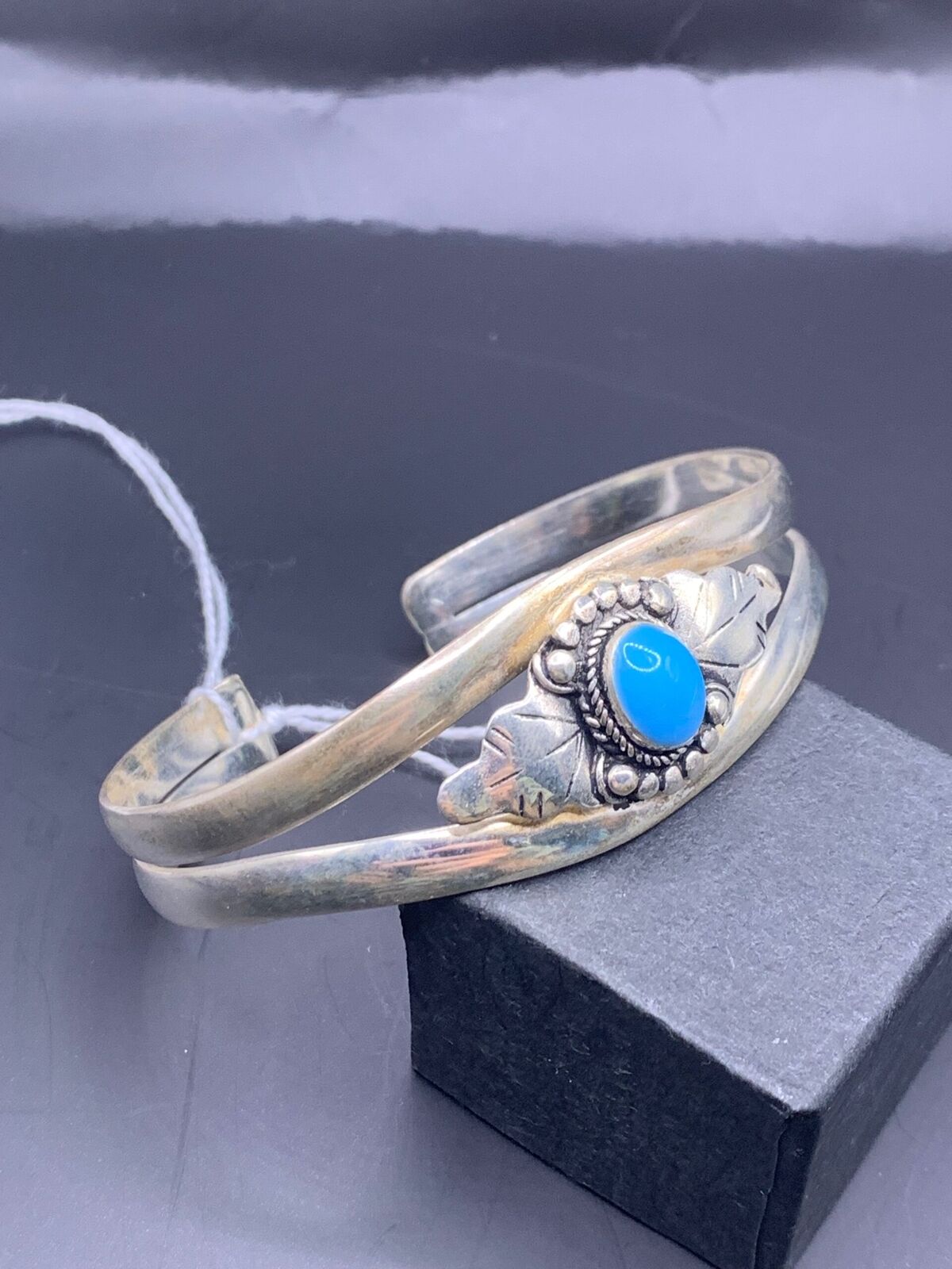 STERLING SILVER BANGLE - CUFF BANGLE WITH LARGE UNIDENTIFIED BLUE STONE