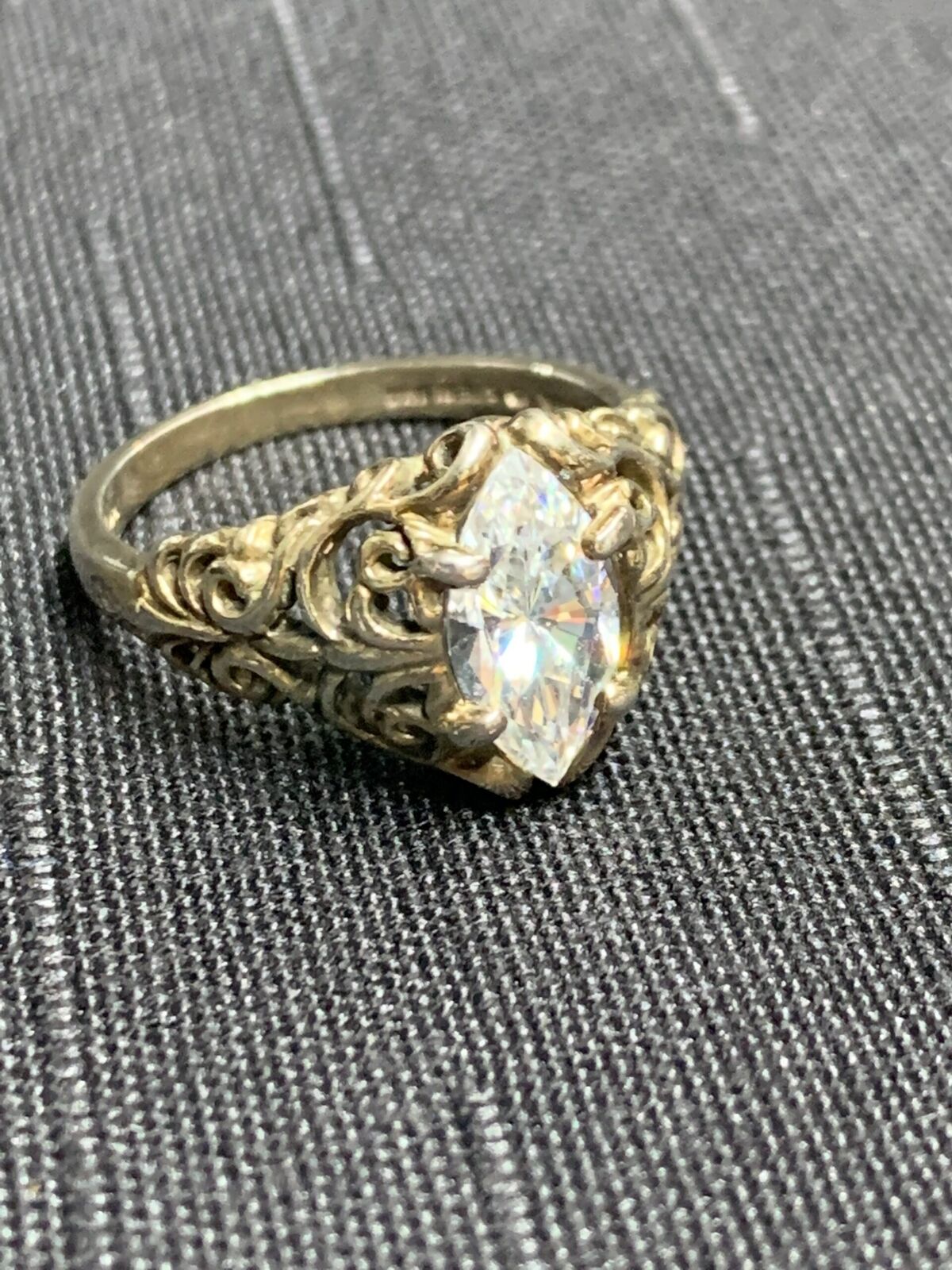 SILVER RING - WITH LARGE UNIDENTIFIED WHITE STONE SETTING