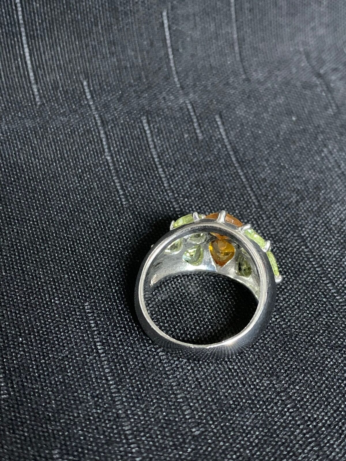 SILVER RING - WITH UNIDENTIFIED STONES IN SETTING