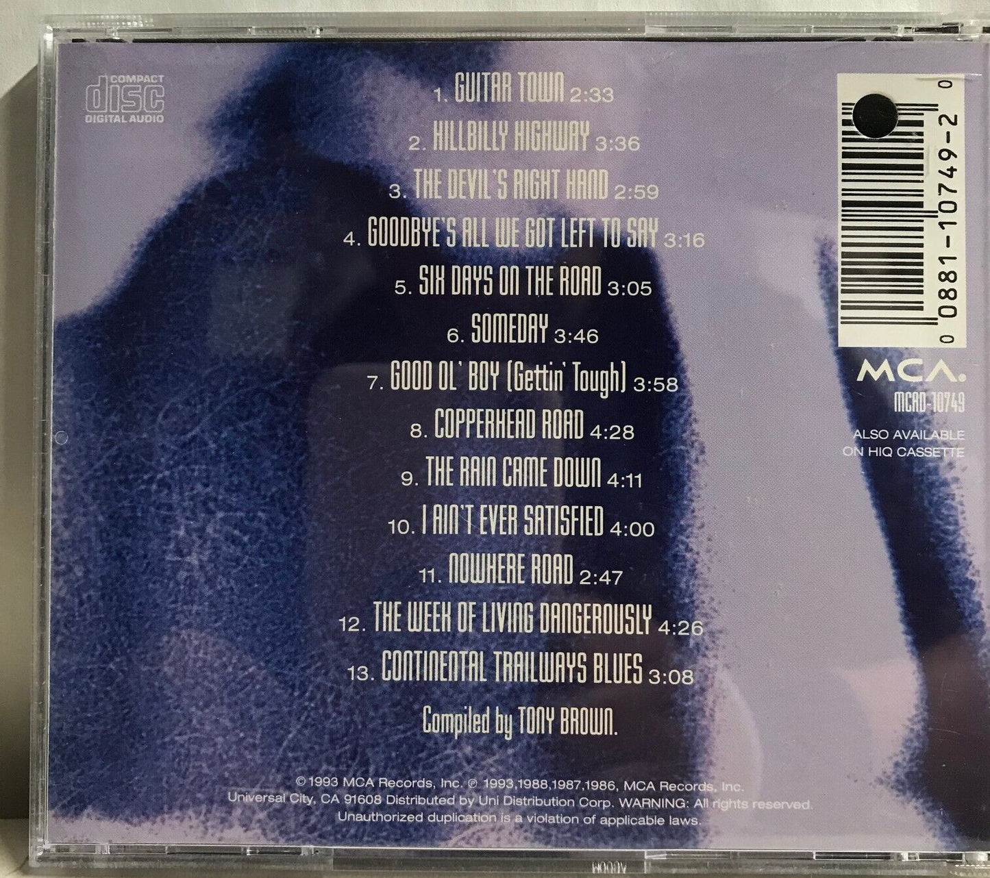 MUSIC CD IN CASE (COVER SIGNED) - STEVE EARLE - ESSENTIAL STEVE EARLE