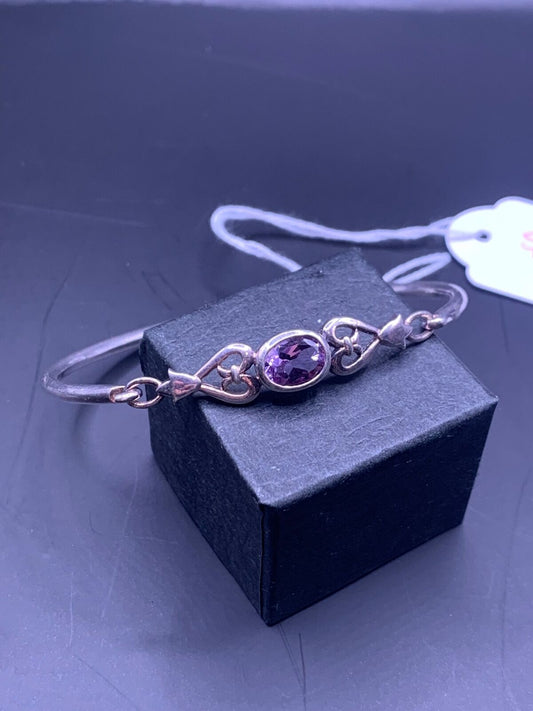 SILVER BANGLE - WITH LARGE UNIDENTIFIED PURPLE STONE