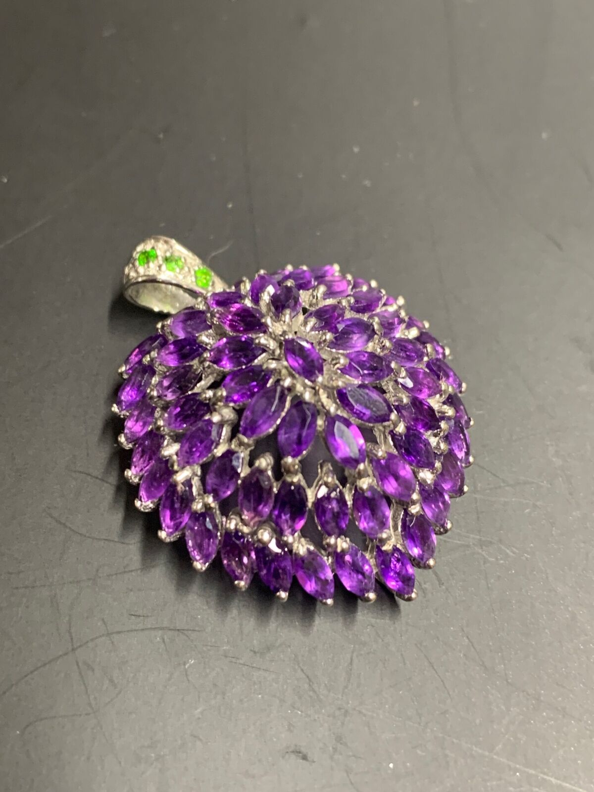 STERLING SILVER PENDANT - MANY UNKNOWN PURPLE STONES